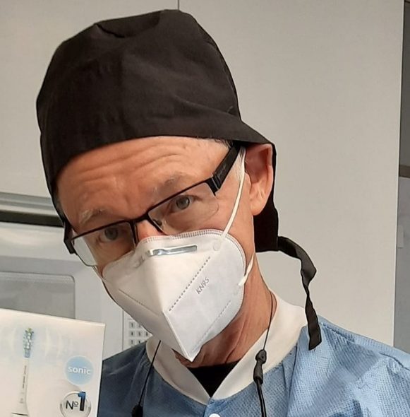 Doctor Voller wearing protective face mask