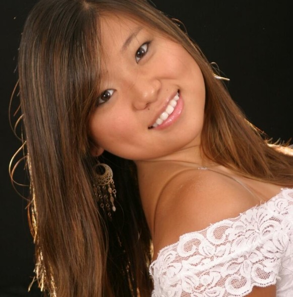 Young woman sharing healthy smile after dental checkup and teeth cleaning visit