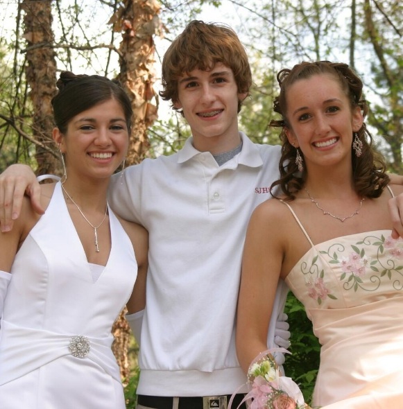 Teens smiling after receiving family dentistry in Kittanning