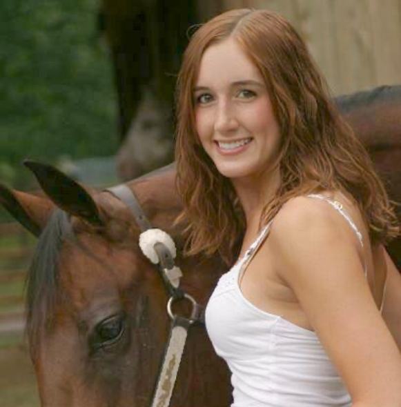 Young woman sharing healthy smile after receiving convenient family dental care