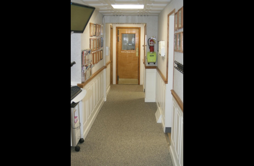 Hallway leading to dental office reception area