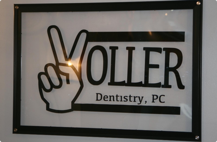 Voller Dentistry P C sign on dental office wall