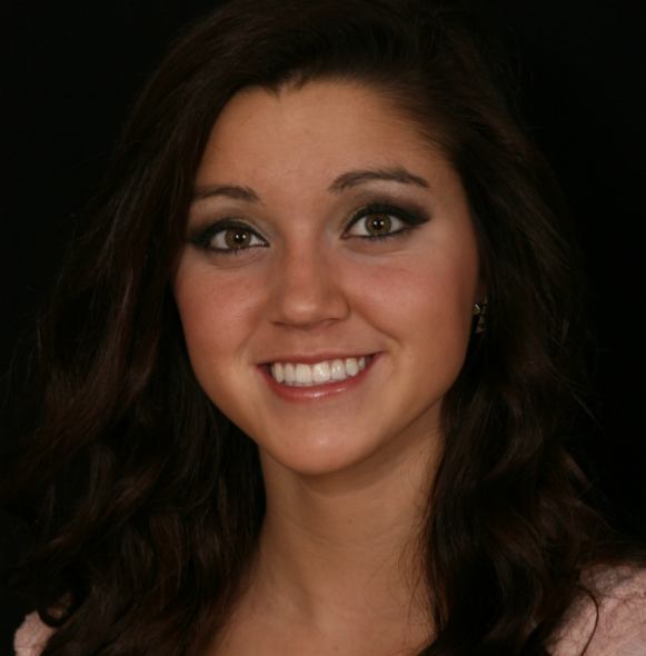 Dental patient with bright smile after teeth whitening