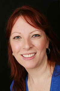 Woman with teeth lengthened by porcelain veneers