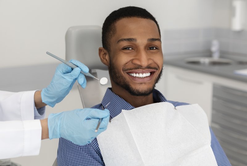 Man using dental insurance in Kittanning for a checkup