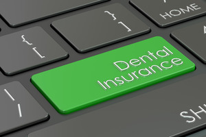 Green key on keyboard labeled “dental insurance”